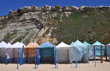 Beach tents on the beach of NazarÃƒÂ©