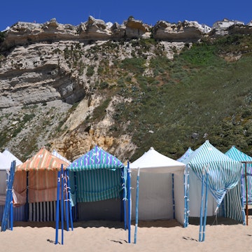 Beach tents on the beach of NazarÃƒÂ©