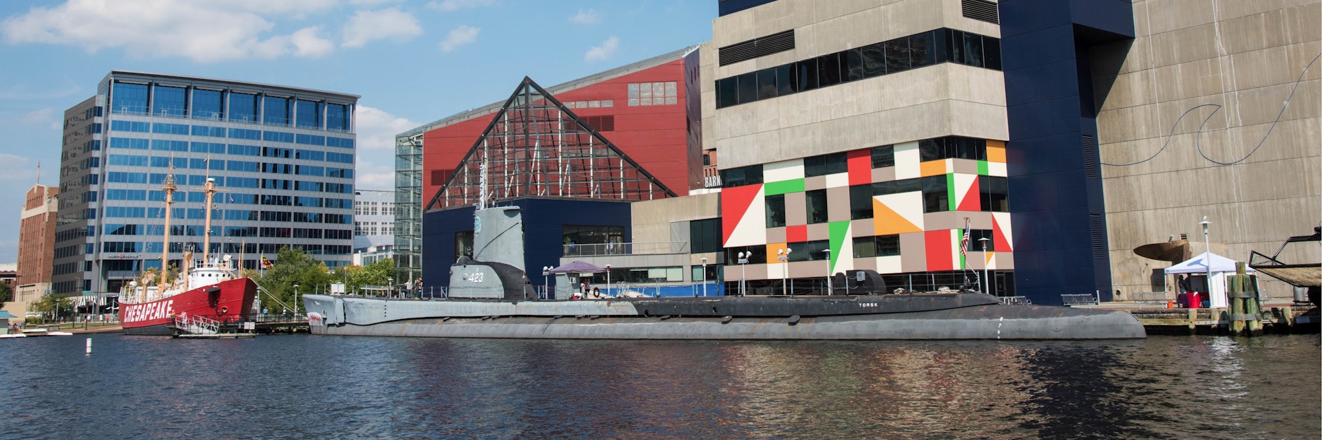 Historic ships in front of the National Aquarium, Baltimore, Maryland. (Photo By: Education Images/UIG via Getty Images)