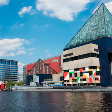 Historic ships in front of the National Aquarium, Baltimore, Maryland. (Photo By: Education Images/UIG via Getty Images)