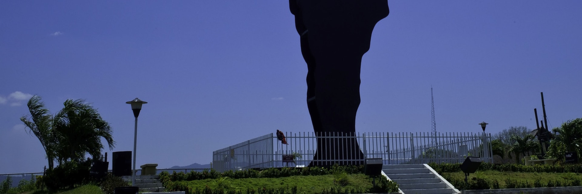 Silhouettes of statue of General Augusto Sandino in Managua, Nicaragua.