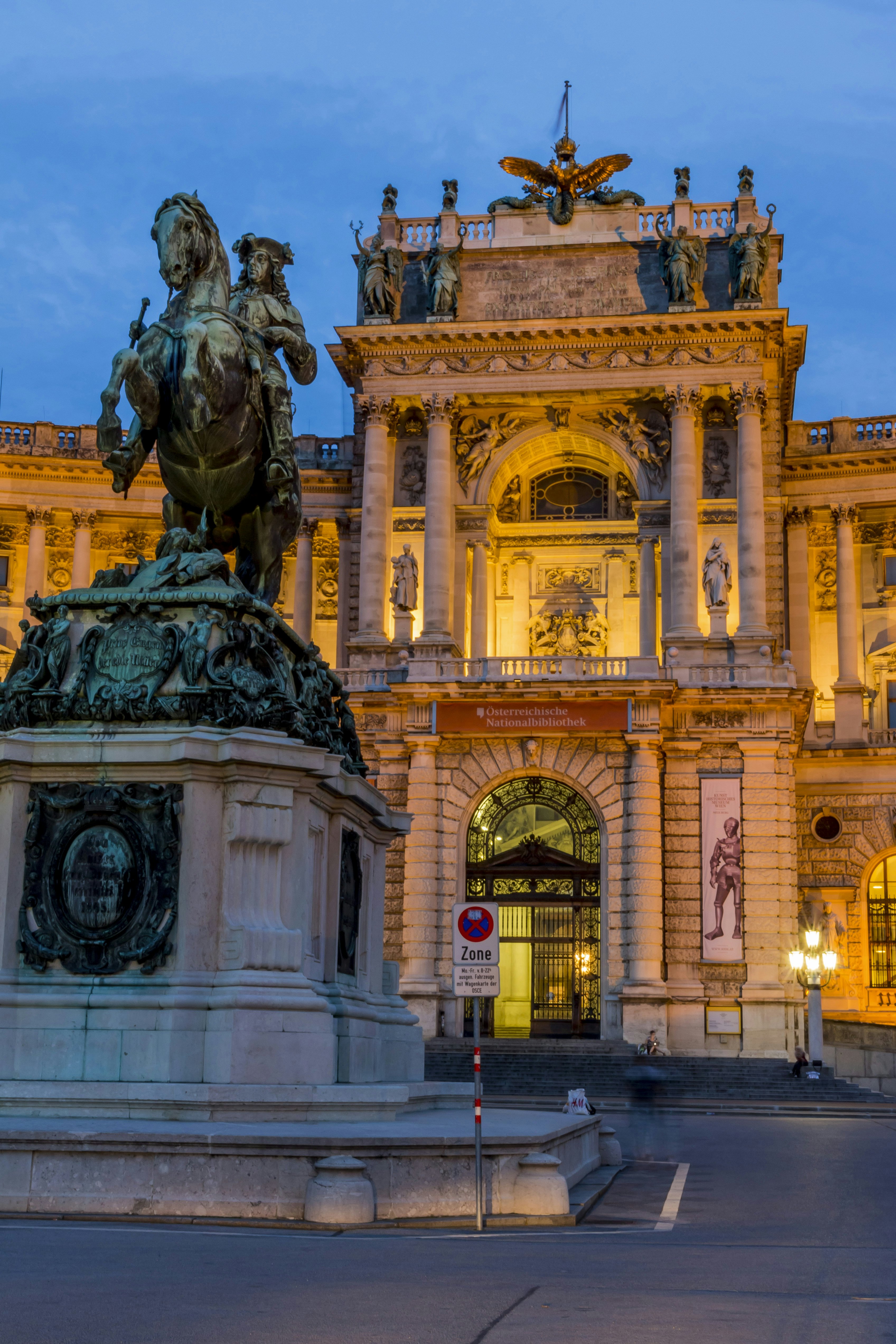 Austria, Vienna, view to lighted Hofburg Palace at twilight