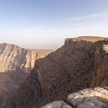 Man standing on the edge of Jebel Akhdar canyon