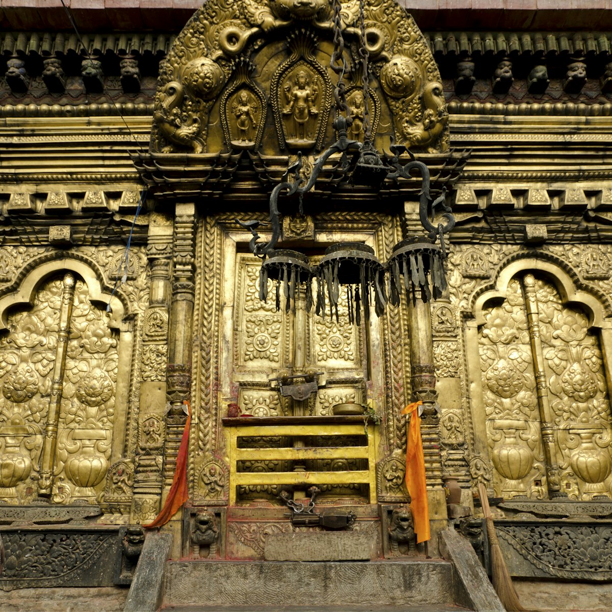 Gold-plated metal door of Temple in Nepal