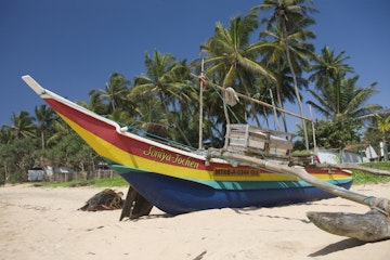 Outrigger on Hikkaduwa Beach,  Sri Lanka
