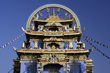 (GERMANY OUT) The wheel of life tops the roof of the Golden Buddha Temple, a Tibetan Buddhist monstery at Namdroling, Karnataka  (Photo by Forster/ullstein bild via Getty Images)