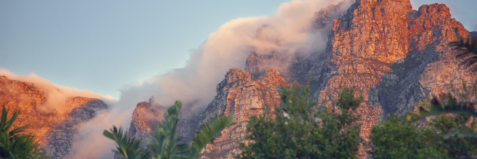 Table Mountain with Tablecloth of cloud at sunset, Cape Town, South Africa