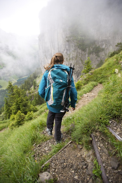 Woman hiking, Appenzellerland, Switzerland.