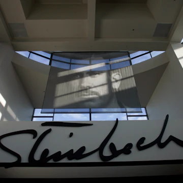 Portrait of John Steinbeck inside the lobby of the National Steinbeck Center in downtown Salinas. The spinach scare is only the latest bad news for Salinas. The biggest city in Monterey County was so broke it nearly shut its libraries two years ago. It s also the least affordable city in the U.S., with the biggest gap between wages and home prices. (Photo by Stephen Osman/Los Angeles Times via Getty Images)