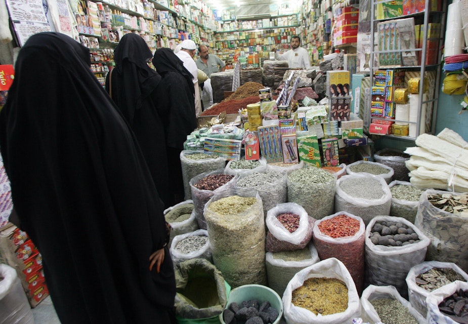 Jeddah, SAUDI ARABIA:  Saudi women shop at a grocery in the Souq al-Alawi market in the old town of Jeddah 29 December 2005. The market is the biggest market in Saudi Arabia where hundreds of thousands of Muslims from different countries have so far arrived for the annual pilgrimage to Mecca which begins on January 7. AFP PHOTO/BEHROUZ MEHRI  (Photo credit should read BEHROUZ MEHRI/AFP/Getty Images)