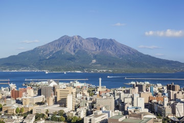 Japan,Kyushu,Kagoshima,Kagoshima City Skyline and Sakurajima Volcano