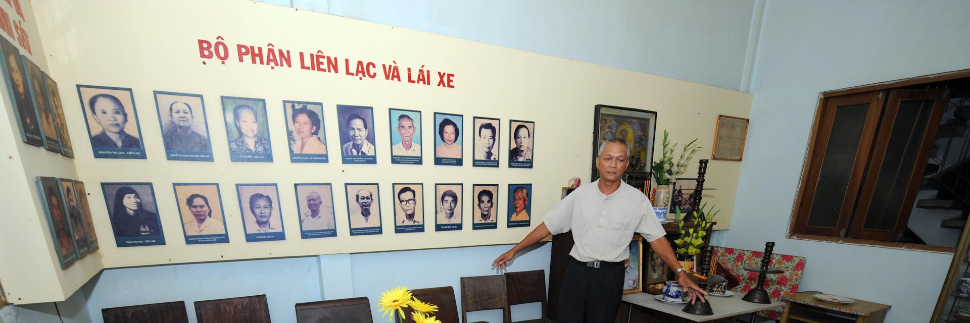TO GO WITH: VIETNAM-MILITARY-TET-OFFENSIVE by Franck ZELLER.Ngo Van Lap, son of Pho Binh restaurant's owner Ngo Toai, a Viet Cong agent, shows in Ho Chi Minh-City, 28 January 2008, the meeting room in the restaurant where was ordered the start of the Vietnam War's Tet 1968 offensive.    AFP PHOTO/HOANG DINH Nam (Photo credit should read HOANG DINH NAM/AFP/Getty Images)