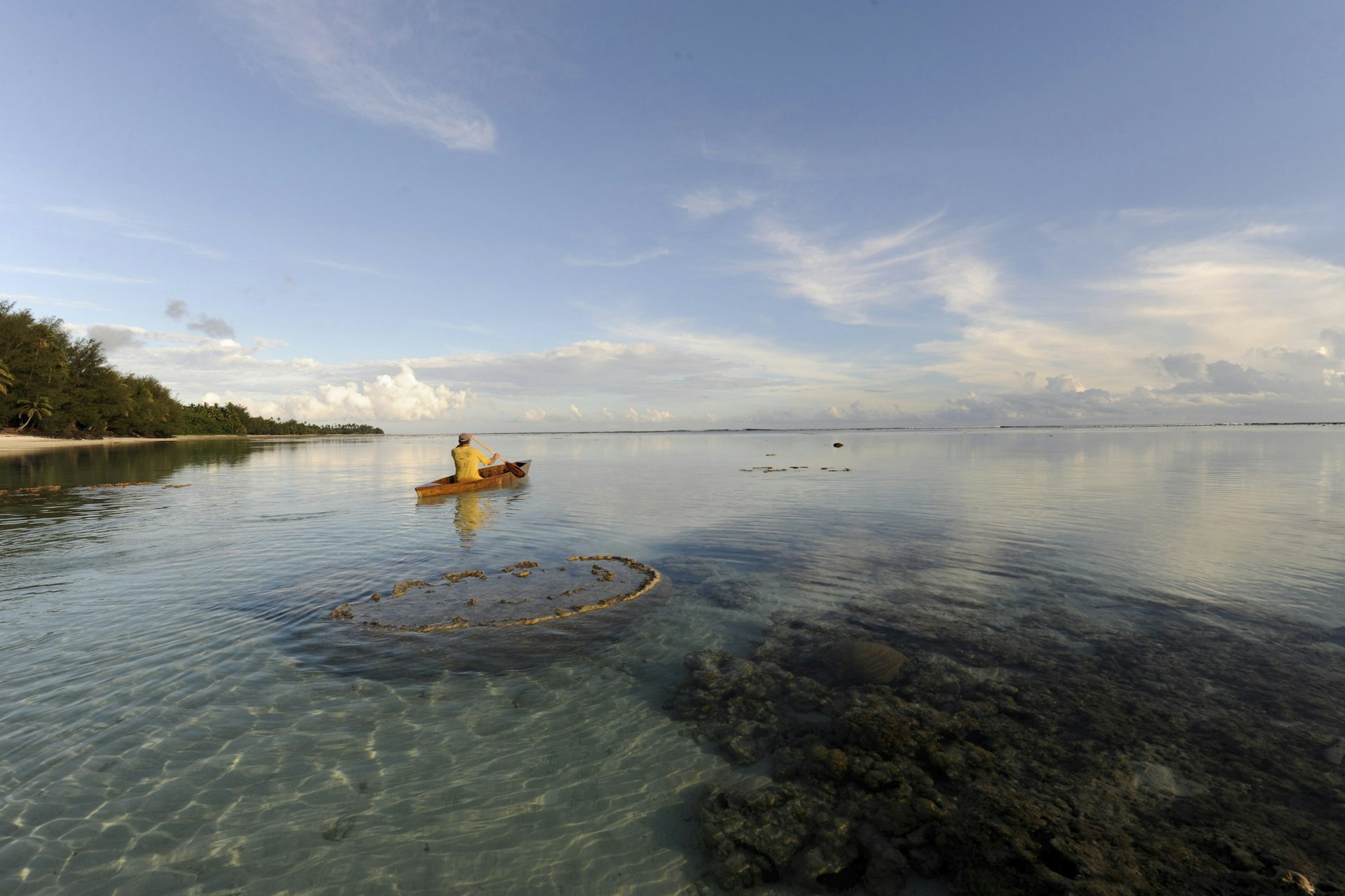 Paddling a canoe on the Raratonga coast