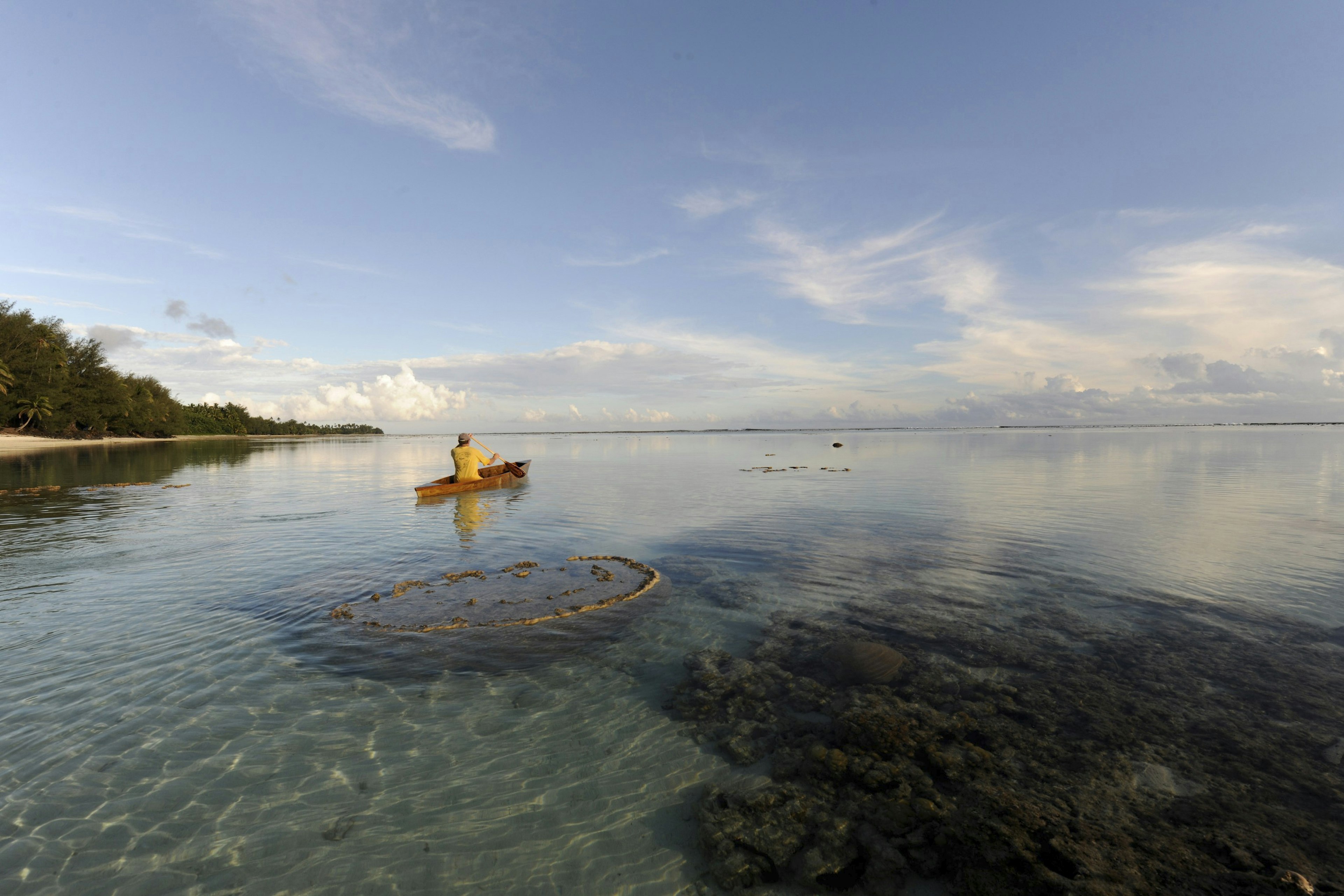 Paddling a canoe on the Raratonga coast