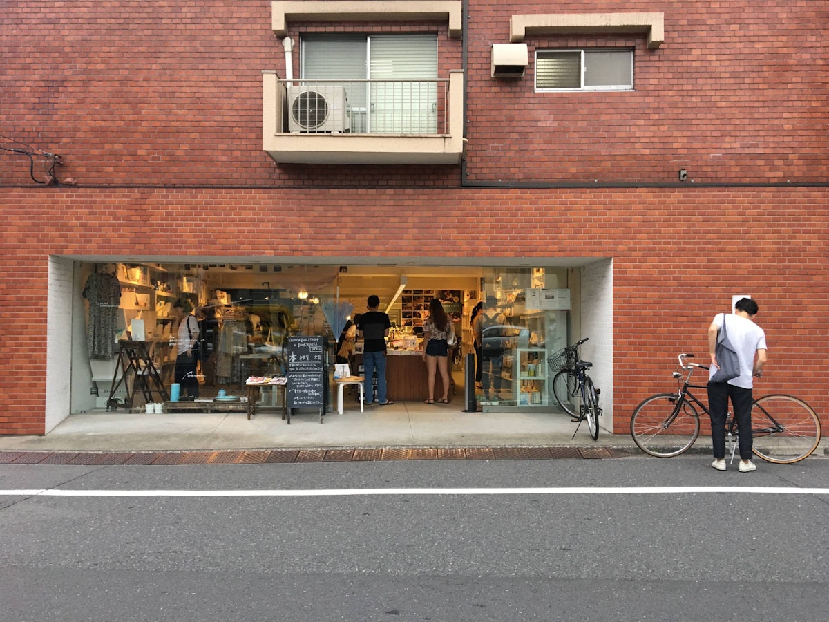 Shop entrance, on the ground floor of an apartment building on the Kamiyamacho shotengai., Shibuya & Shimo-Kitazawa.