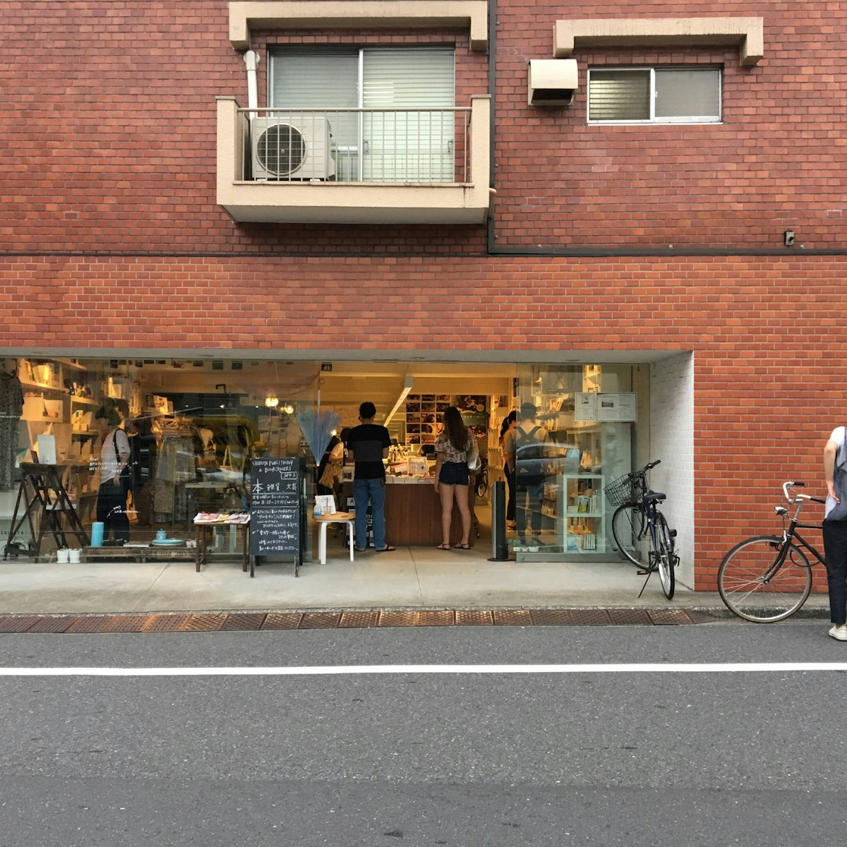 Shop entrance, on the ground floor of an apartment building on the Kamiyamacho shotengai., Shibuya & Shimo-Kitazawa.