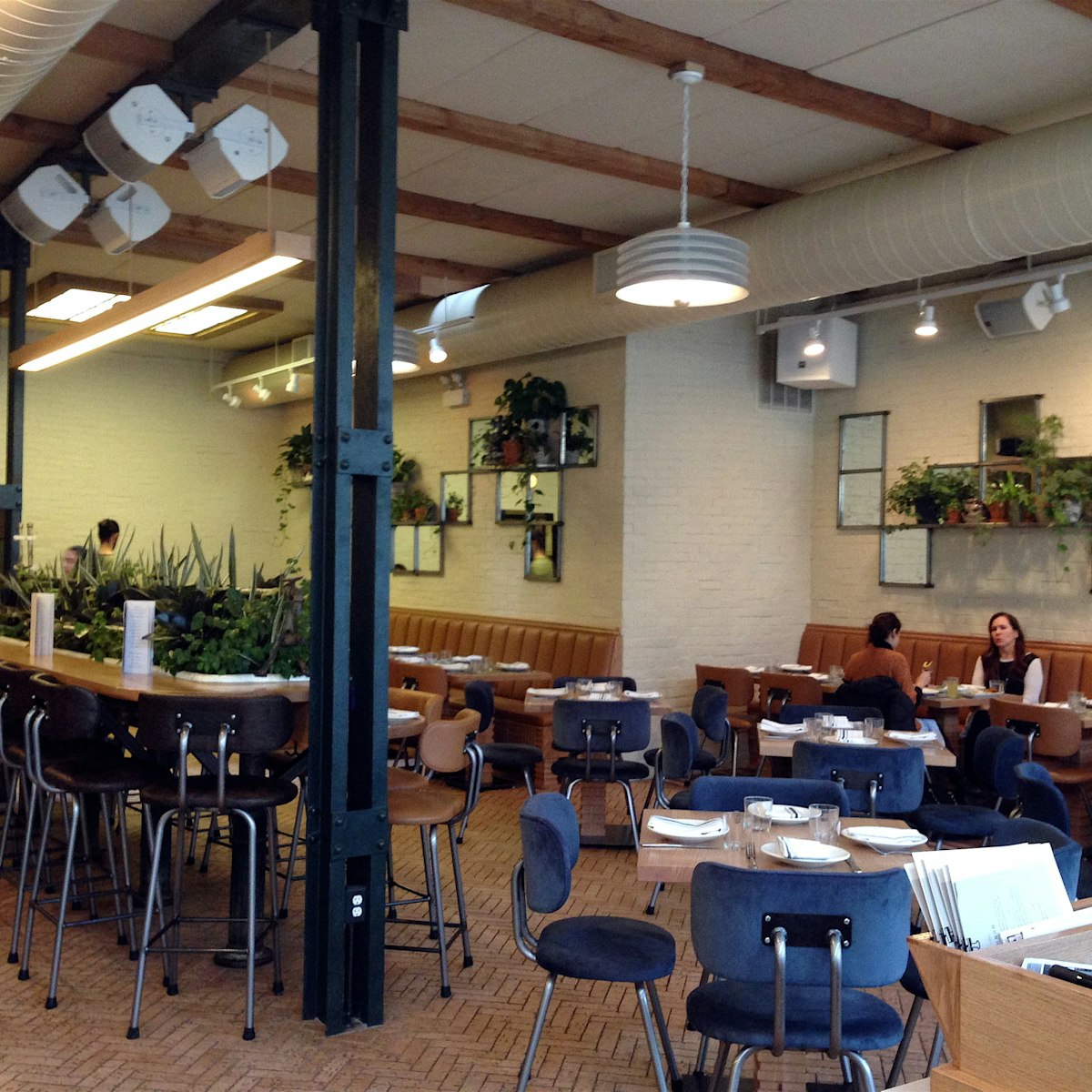 The plant-filled interior of Bad Hunter in Chicago.