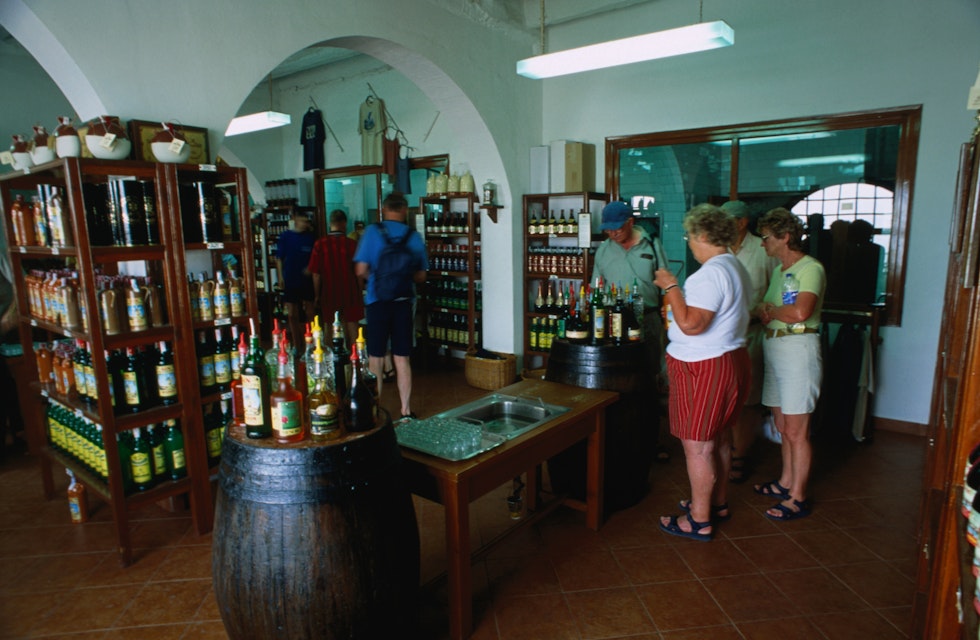 Tourists inside the Xoriguer Gin Distillery.