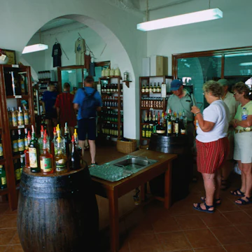 Tourists inside the Xoriguer Gin Distillery.