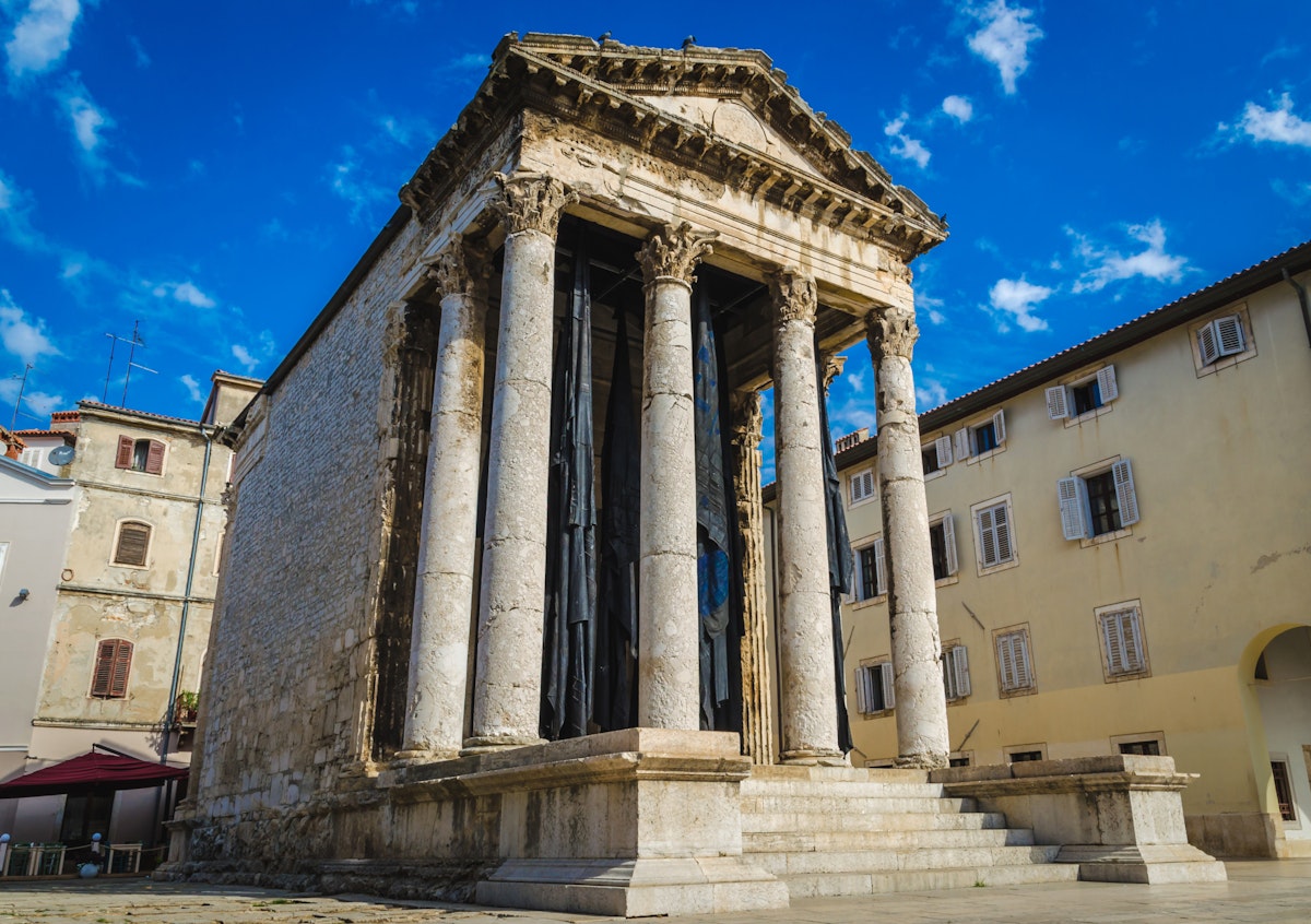 Pula Croatia, Istria Peninsula 17.09.2018..Temple of Augustus..Arch of the Sergii..Pula Communal Palace; Shutterstock ID 1232040358; Your name (First / Last): Anna Tyler; GL account no.: 65050; Netsuite department name: Online Editorial; Full Product or Project name including edition: destination-image-southern-europe