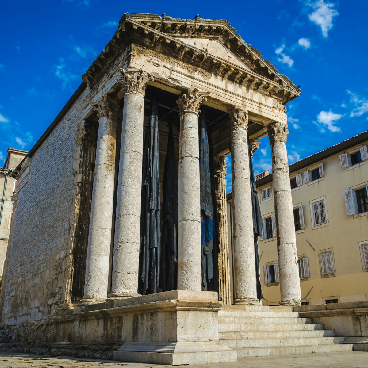 Pula Croatia, Istria Peninsula 17.09.2018..Temple of Augustus..Arch of the Sergii..Pula Communal Palace; Shutterstock ID 1232040358; Your name (First / Last): Anna Tyler; GL account no.: 65050; Netsuite department name: Online Editorial; Full Product or Project name including edition: destination-image-southern-europe