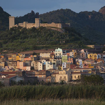 Italy, Sardinia, Western Sardinia, Bosa, town view with Castello Malaspina, sunset