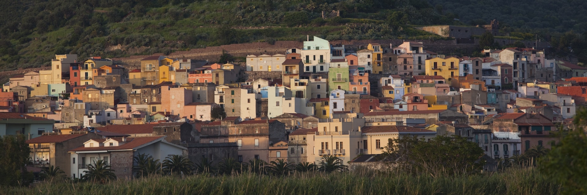 Italy, Sardinia, Western Sardinia, Bosa, town view with Castello Malaspina, sunset