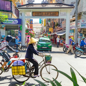 Ho Chi Minh City, Vietnam e January, 2017: street view of Pham Ngu Lao.street, the backpacker district of Saigon.; Shutterstock ID 569235004; Your name (First / Last): Laura Crawford; GL account no.: 65050; Netsuite department name: Online Editorial; Full Product or Project name including edition: HCMC & Nagasaki page images BiA
