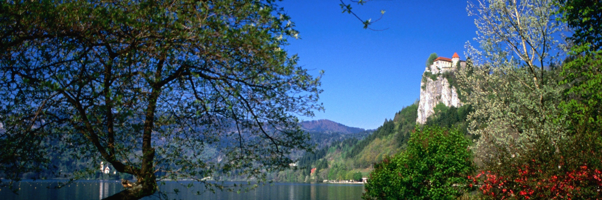 Perched on a cliff, Bled Castle (Blejski Grad) overlooks the picturesque Lake Bled.