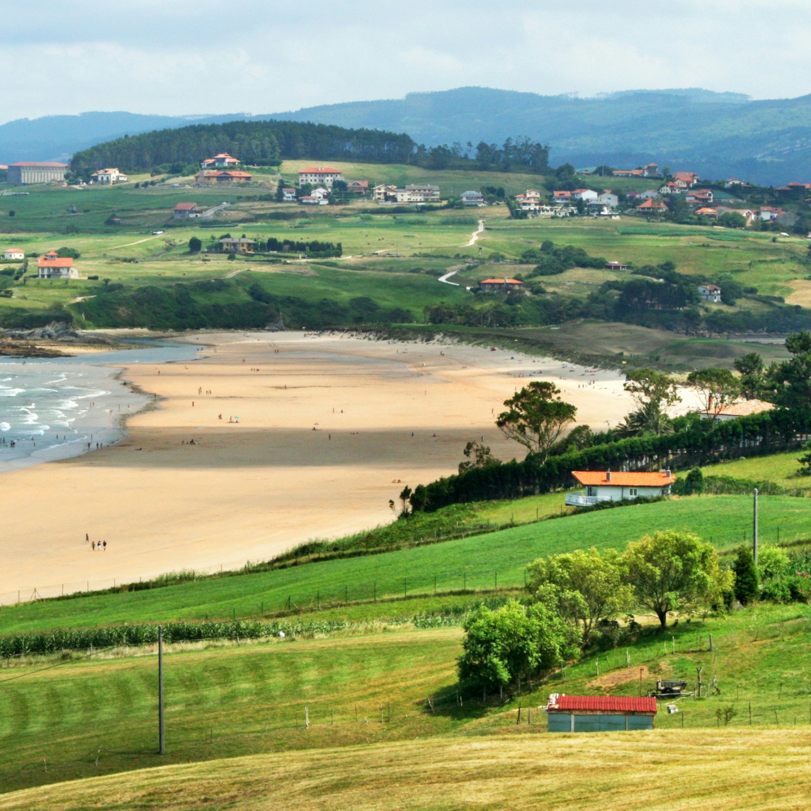 View on Playa de Oyambre y la Rabia, located on the bay of Biscay, Cantabria, Spain.; Shutterstock ID 1052635787