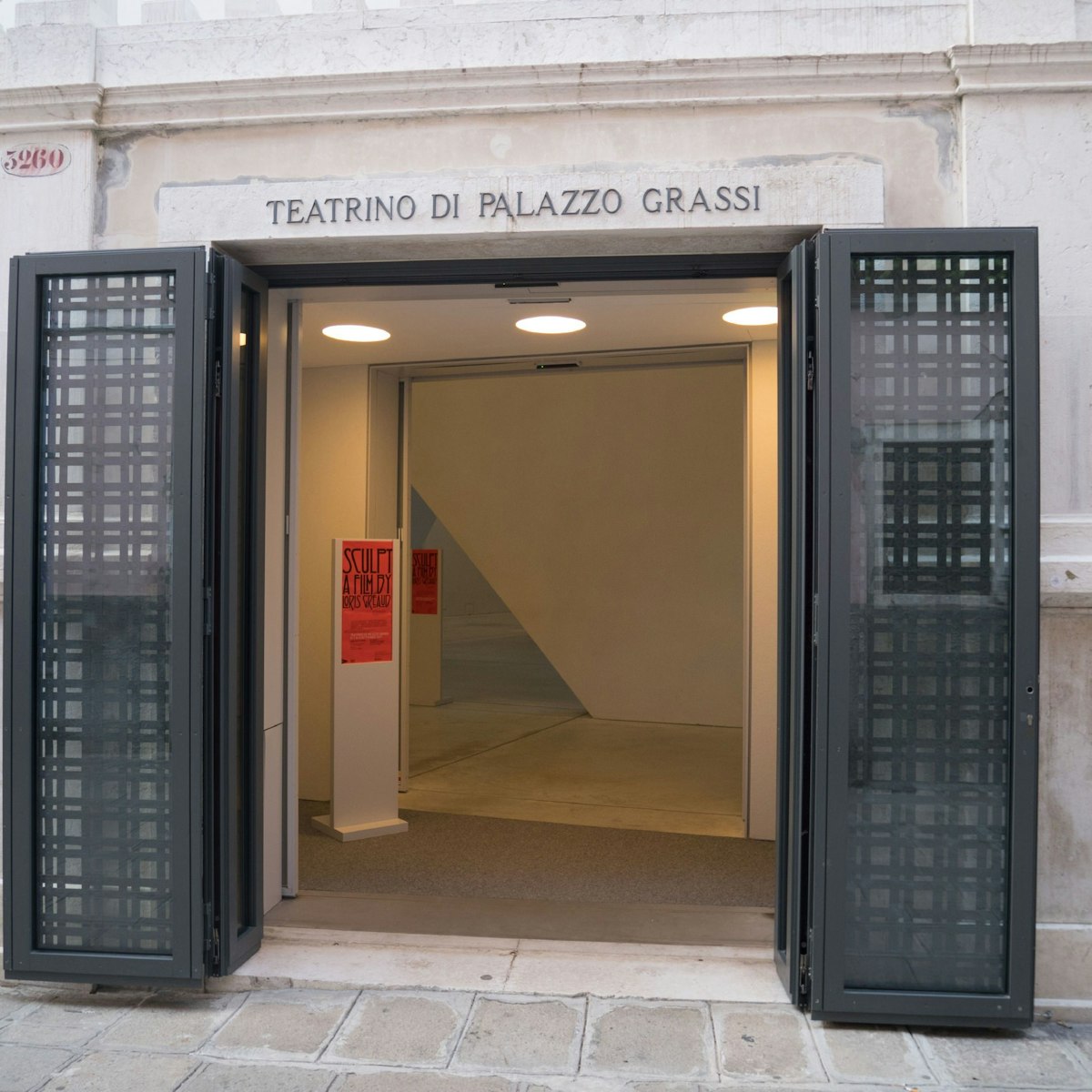 The gated entrance designed by Tadao Ando to the Teatrino Palazzo Grassi