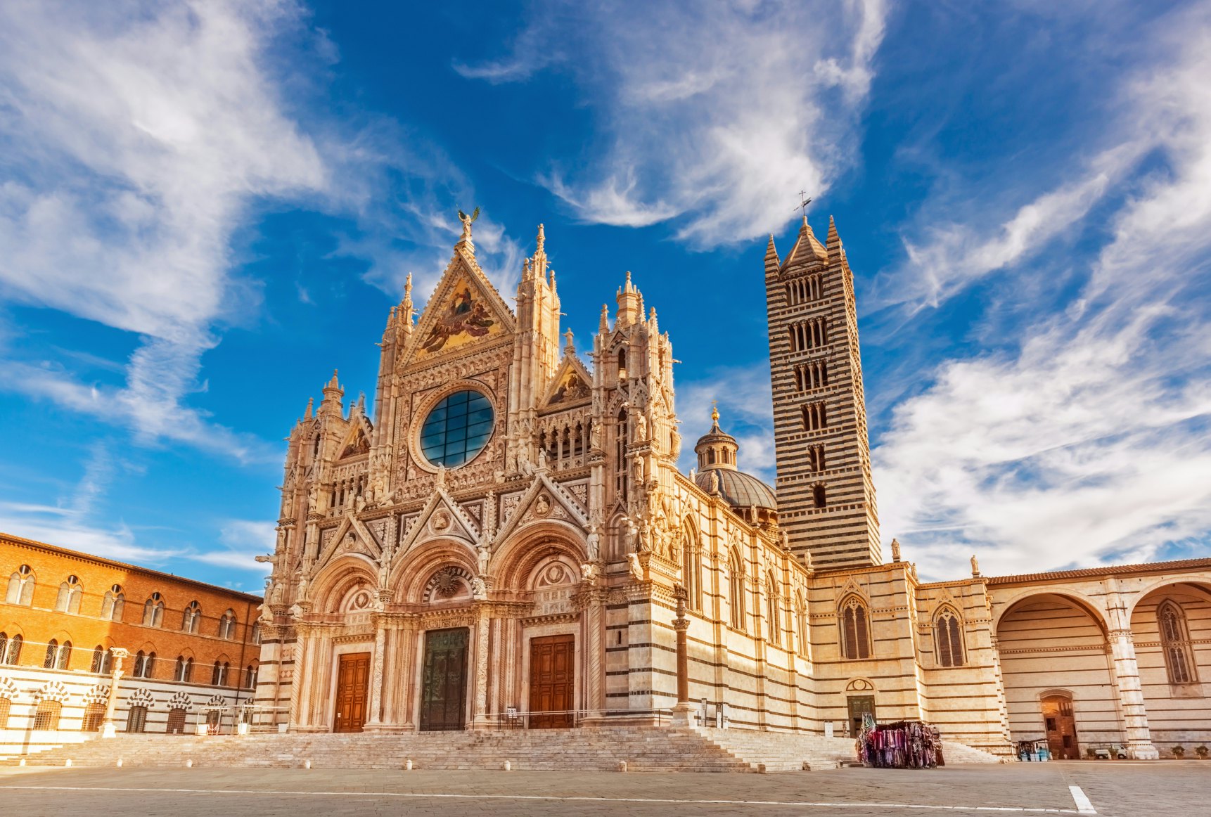 Siena Cathedral (Duomo di Siena) is a medieval church, now dedicated to the Assumption of Mary, completed between 1215 and 1263, Siena, Italy; Shutterstock ID 1027666891; Your name (First / Last): Anna Tyler; GL account no.: 65050; Netsuite department name: Online Editorial; Full Product or Project name including edition: destination-image-southern-europe