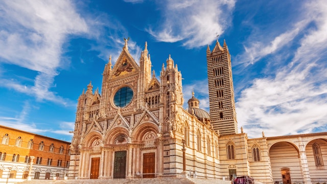 Siena Cathedral (Duomo di Siena) is a medieval church, now dedicated to the Assumption of Mary, completed between 1215 and 1263, Siena, Italy; Shutterstock ID 1027666891; Your name (First / Last): Anna Tyler; GL account no.: 65050; Netsuite department name: Online Editorial; Full Product or Project name including edition: destination-image-southern-europe