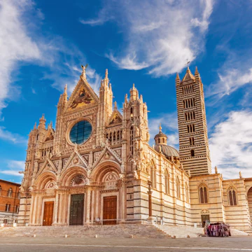 Siena Cathedral (Duomo di Siena) is a medieval church, now dedicated to the Assumption of Mary, completed between 1215 and 1263, Siena, Italy; Shutterstock ID 1027666891; Your name (First / Last): Anna Tyler; GL account no.: 65050; Netsuite department name: Online Editorial; Full Product or Project name including edition: destination-image-southern-europe