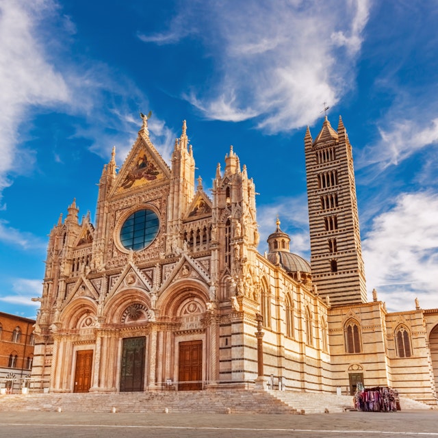 Siena Cathedral (Duomo di Siena) is a medieval church, now dedicated to the Assumption of Mary, completed between 1215 and 1263, Siena, Italy; Shutterstock ID 1027666891; Your name (First / Last): Anna Tyler; GL account no.: 65050; Netsuite department name: Online Editorial; Full Product or Project name including edition: destination-image-southern-europe