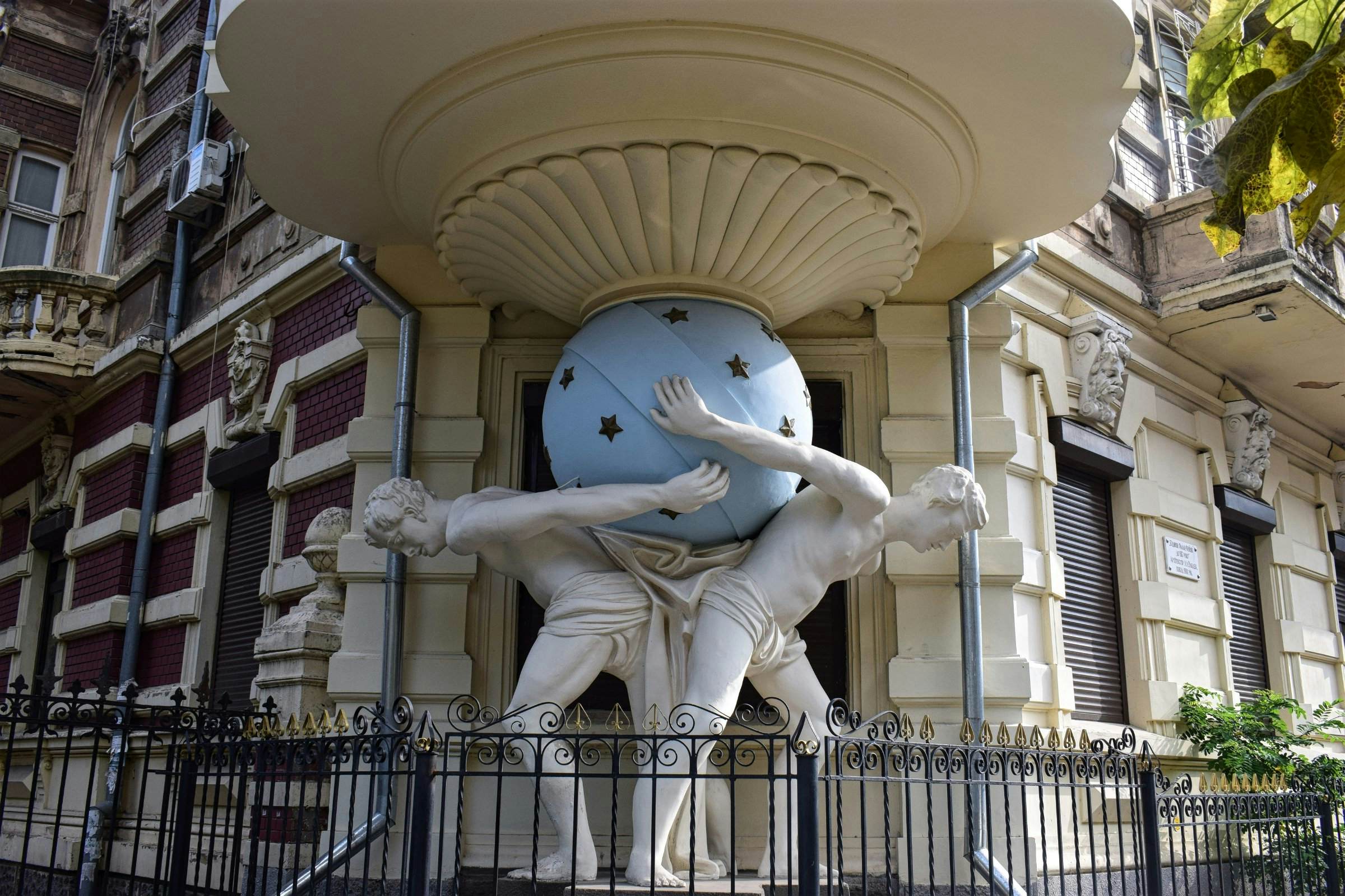The two atlantes holding a sphere on the art nouveau facade of Falz-Fein House