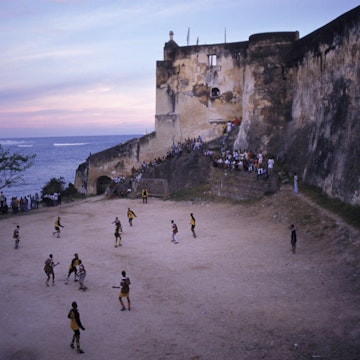 People playing soccer, Fort Jesus, Mombasa, Kenya, Africa