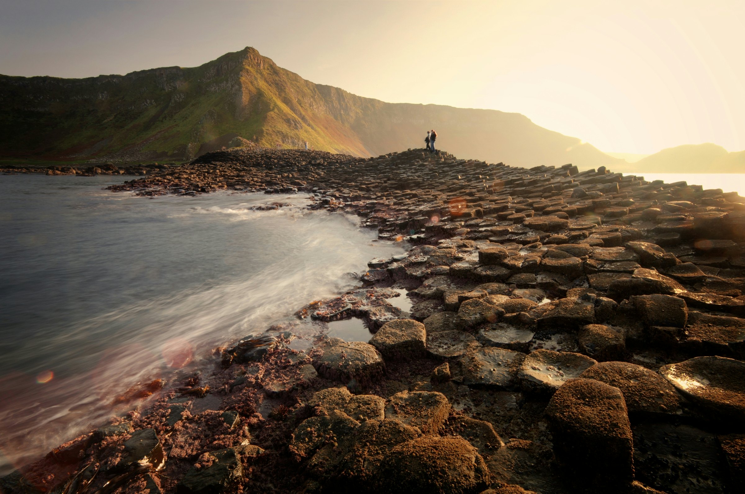 Setting sun over the The Giants Causeway, County Antrim, Northern Ireland.