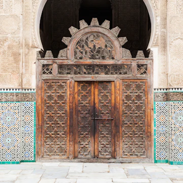 The Medersa Bou Inania is a madrasa in Fes, Morocco. Medersa Bou Inania is acknowledged as an excellent example of Marinid architecture.; Shutterstock ID 1066026653; Your name (First / Last): Lauren Keith; GL account no.: 65050; Netsuite department name: Online Editorial; Full Product or Project name including edition: POI image update