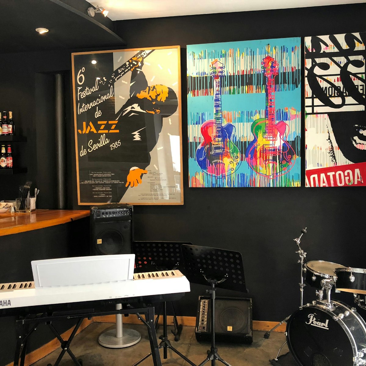 Naima Jazz Cafe instruments, pictures on wall, bar