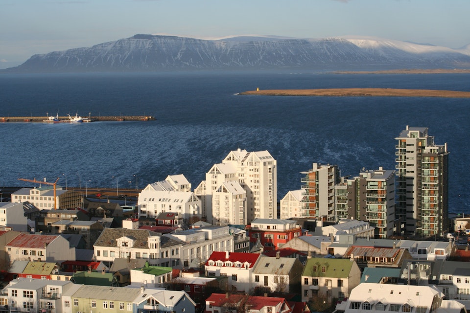 Harbour with mountains in distance.