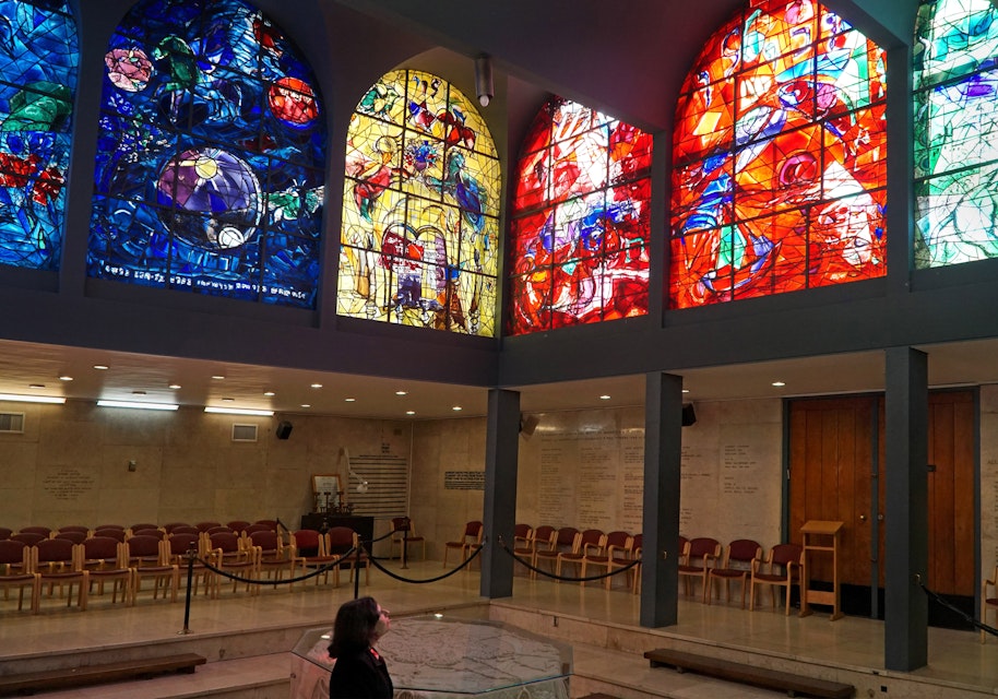 JERUSALEM - JANUARY 2017:  Hadassah Hospital's synagogue is decorated with Chagall's colorful stained glass windows depicting the tribes of Israel, as seen in Jerusalem circa 2017.; Shutterstock ID 569671492; Your name (First / Last): Lauren Keith; GL account no.: 65050; Netsuite department name: Online Editorial; Full Product or Project name including edition: Israel Update 2017