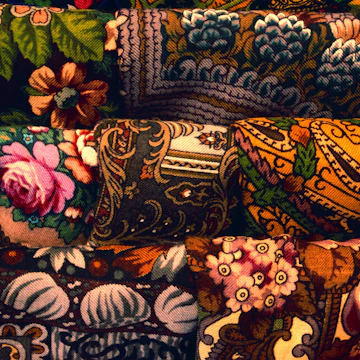 Folk Art shop inside Stroganov Palace - traditional Russian scarves.