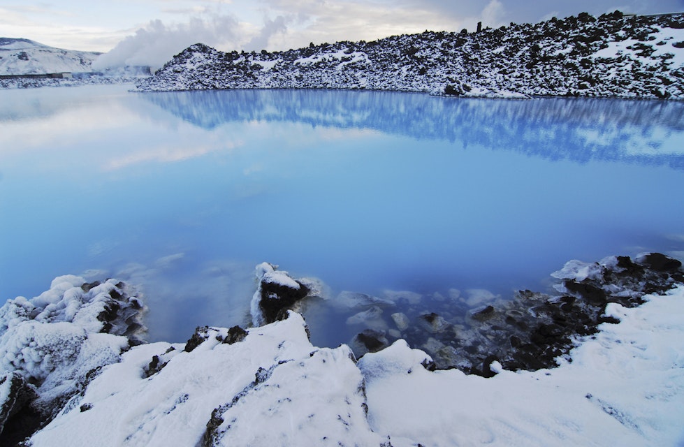 Vibrant Blue Lake Surrounded By Rocky Lava Field, Blue Lagoon, Iceland