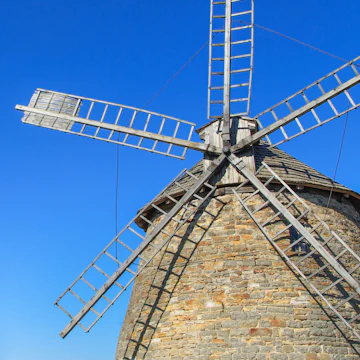 Wind mill isolated on the sky; Shutterstock ID 184358495; Your name (First / Last): Lauren Gillmore; GL account no.: 56530; Netsuite department name: Online-Design; Full Product or Project name including edition: 65050/ Online Design /LaurenGillmore/POI