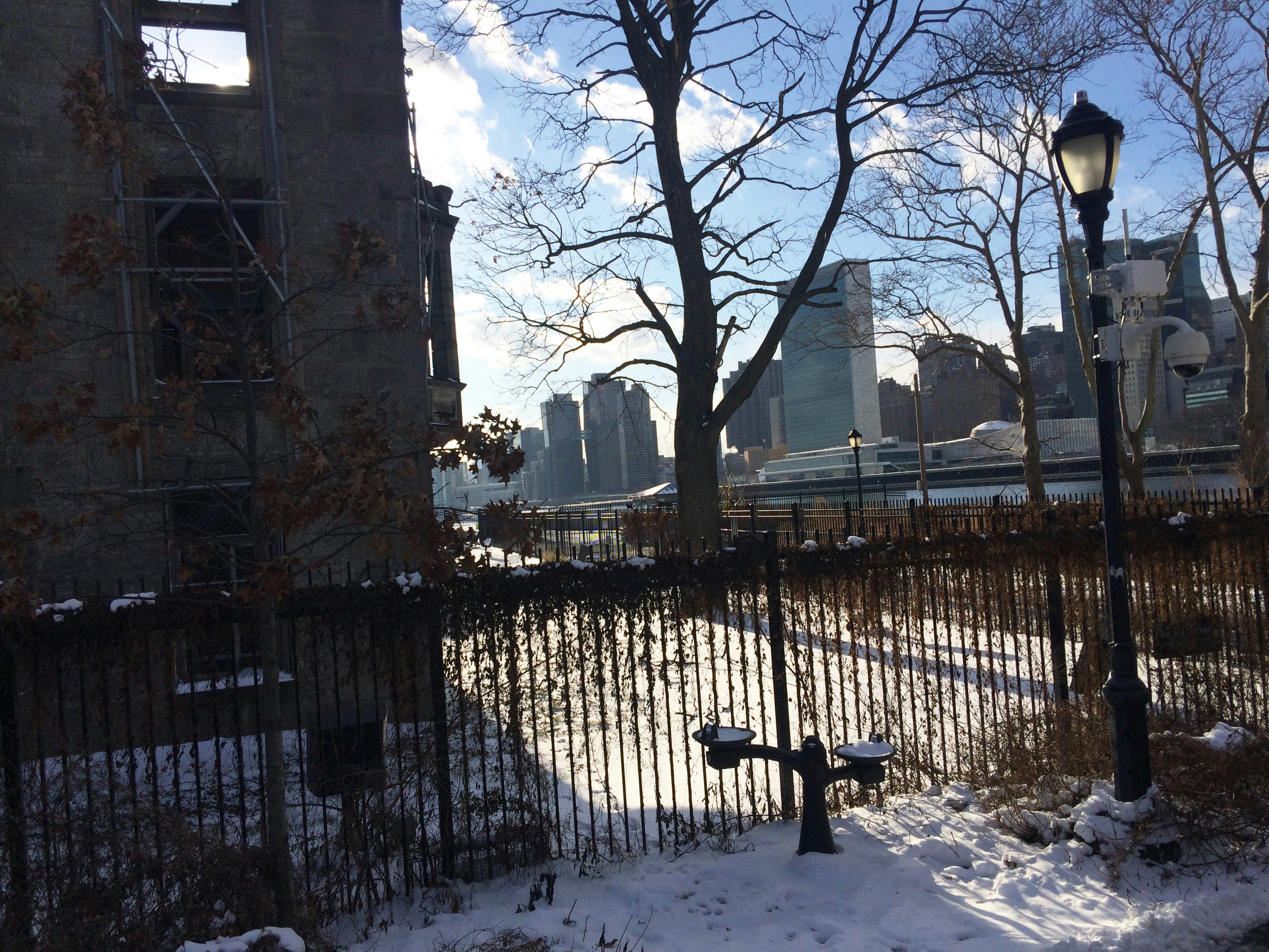 A view of the Renwick Ruin with the Manhattan skyline in the background.