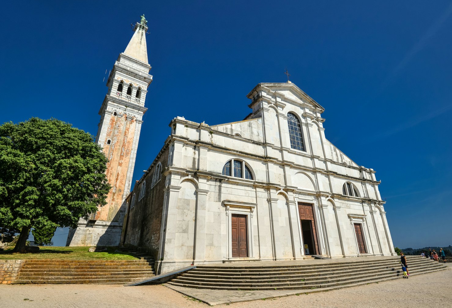 Rovinj, Croatia - May 22, 2018: St. Euphemia's Basilica, Rovinj, Croatia. Аn ancient church with a bell tower.; Shutterstock ID 1138512785; Your name (First / Last): Anna Tyler; GL account no.: 65050; Netsuite department name: Online Editorial; Full Product or Project name including edition: destination-image-southern-europe