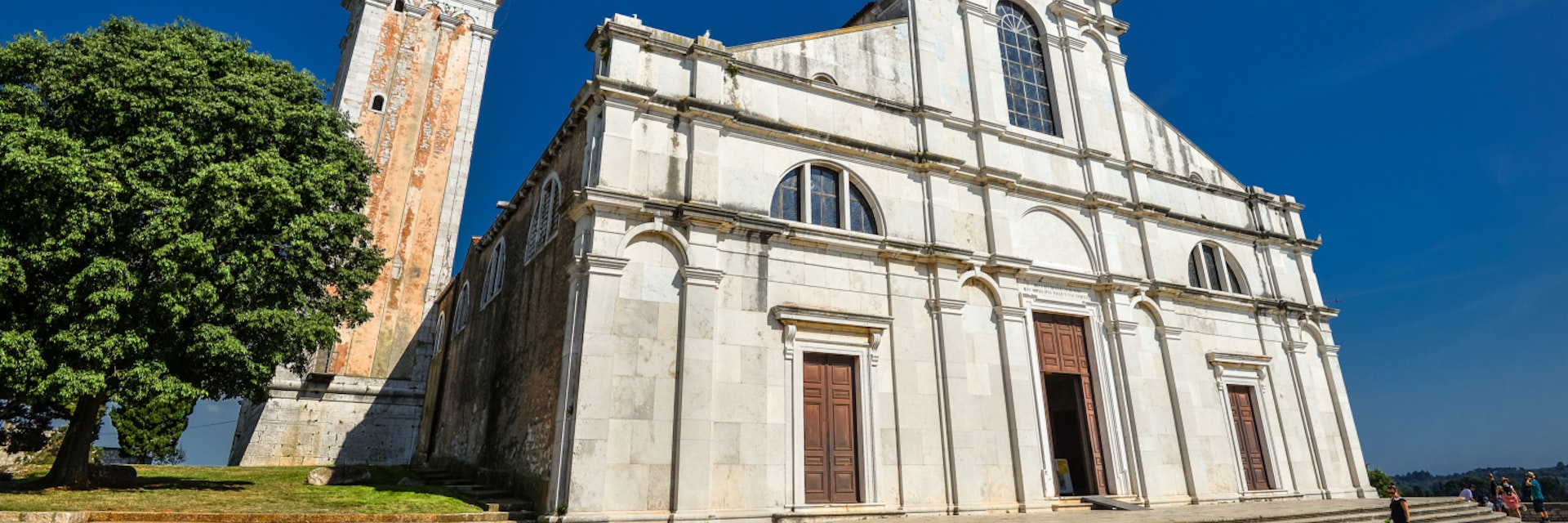 Rovinj, Croatia - May 22, 2018: St. Euphemia's Basilica, Rovinj, Croatia. Аn ancient church with a bell tower.; Shutterstock ID 1138512785; Your name (First / Last): Anna Tyler; GL account no.: 65050; Netsuite department name: Online Editorial; Full Product or Project name including edition: destination-image-southern-europe