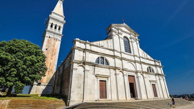 Rovinj, Croatia - May 22, 2018: St. Euphemia's Basilica, Rovinj, Croatia. Аn ancient church with a bell tower.; Shutterstock ID 1138512785; Your name (First / Last): Anna Tyler; GL account no.: 65050; Netsuite department name: Online Editorial; Full Product or Project name including edition: destination-image-southern-europe