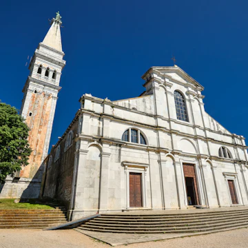 Rovinj, Croatia - May 22, 2018: St. Euphemia's Basilica, Rovinj, Croatia. Аn ancient church with a bell tower.; Shutterstock ID 1138512785; Your name (First / Last): Anna Tyler; GL account no.: 65050; Netsuite department name: Online Editorial; Full Product or Project name including edition: destination-image-southern-europe